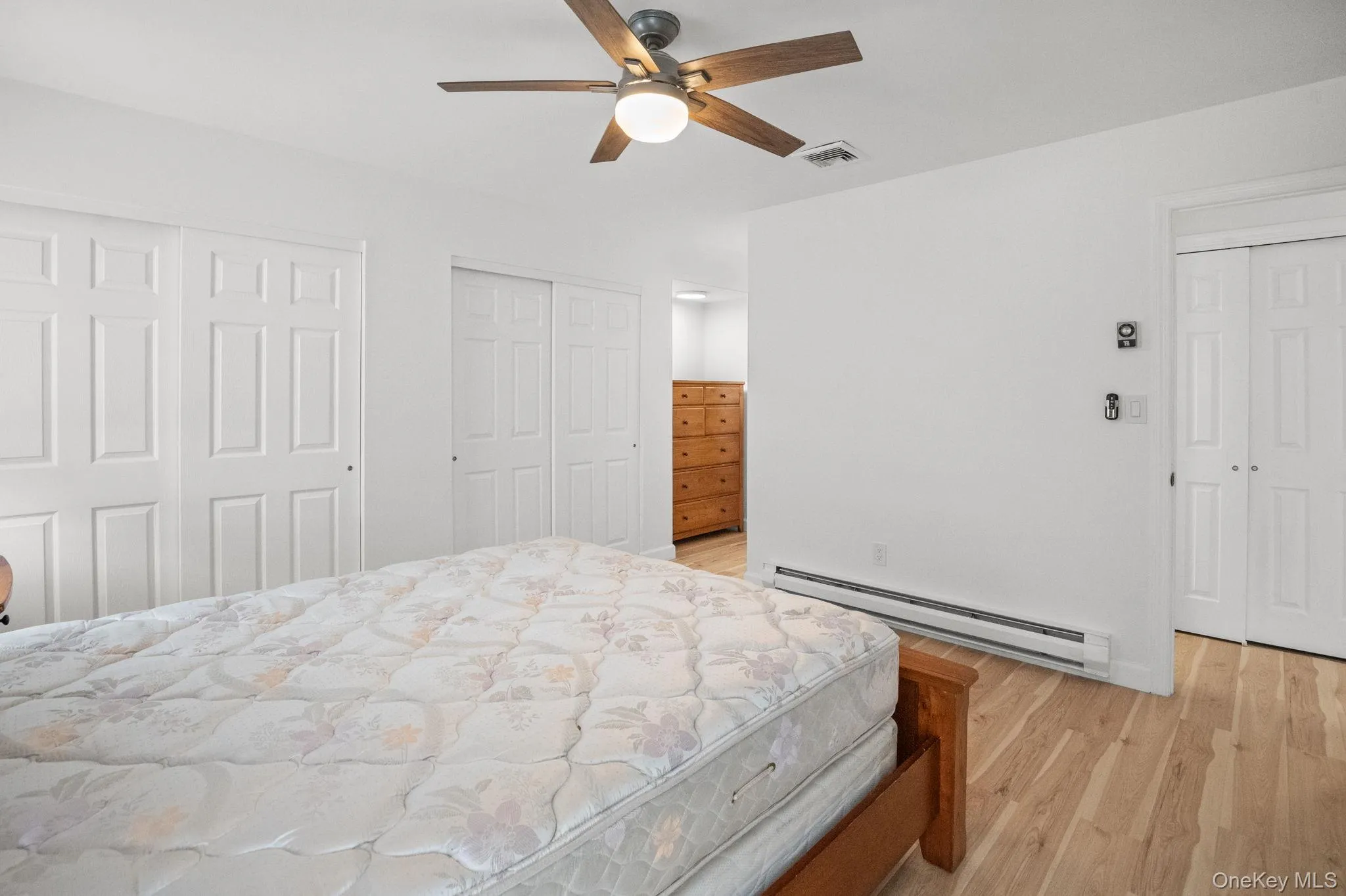 Double closets and updated finishes offer both comfort and functionality in the beautifully refreshed primary suite. Double closets and updated finishes offer both comfort and functionality in the beautifully refreshed primary suite.