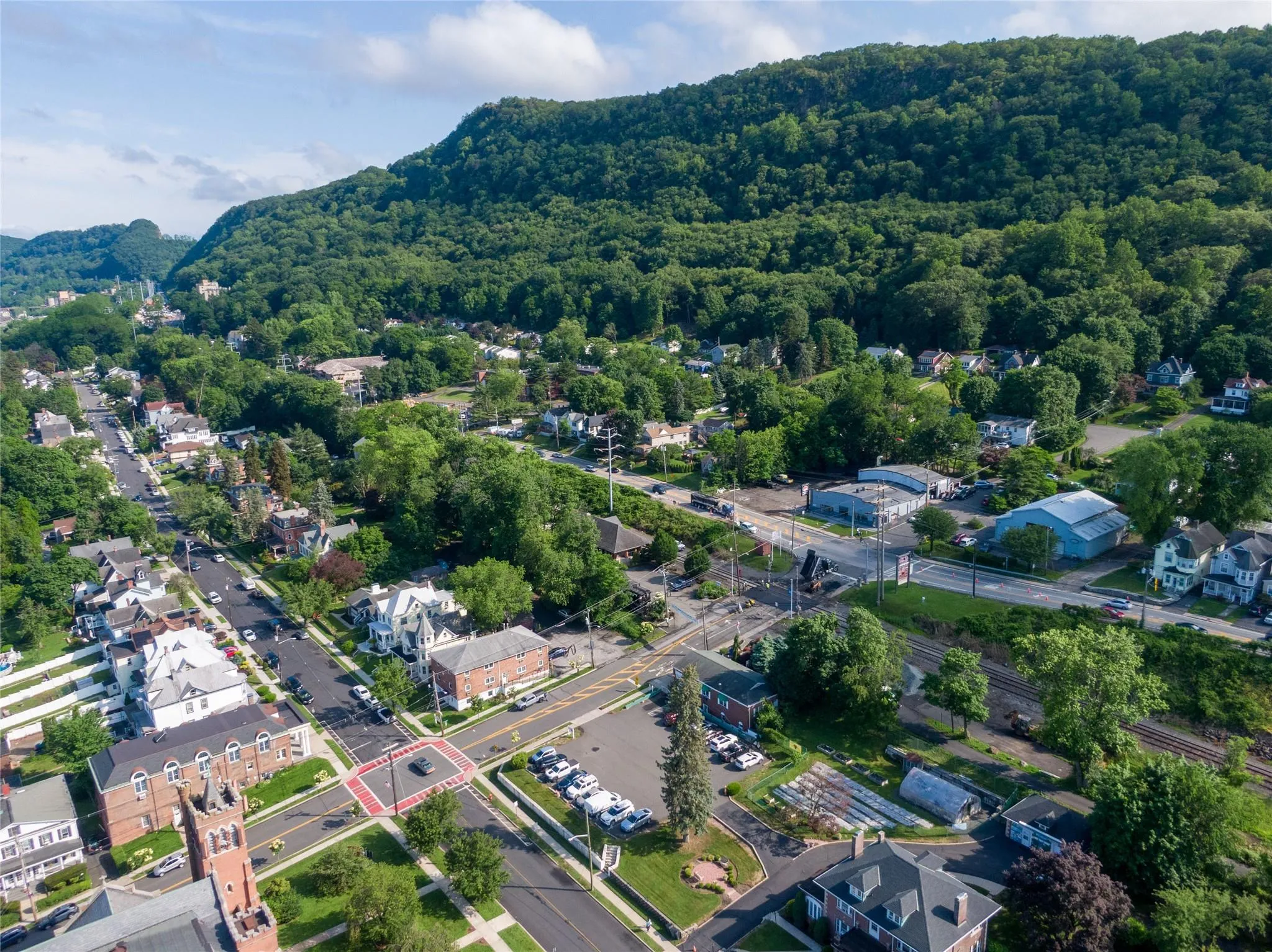 Aerial view of property's location featuring a forest Aerial view of property's location featuring a forest