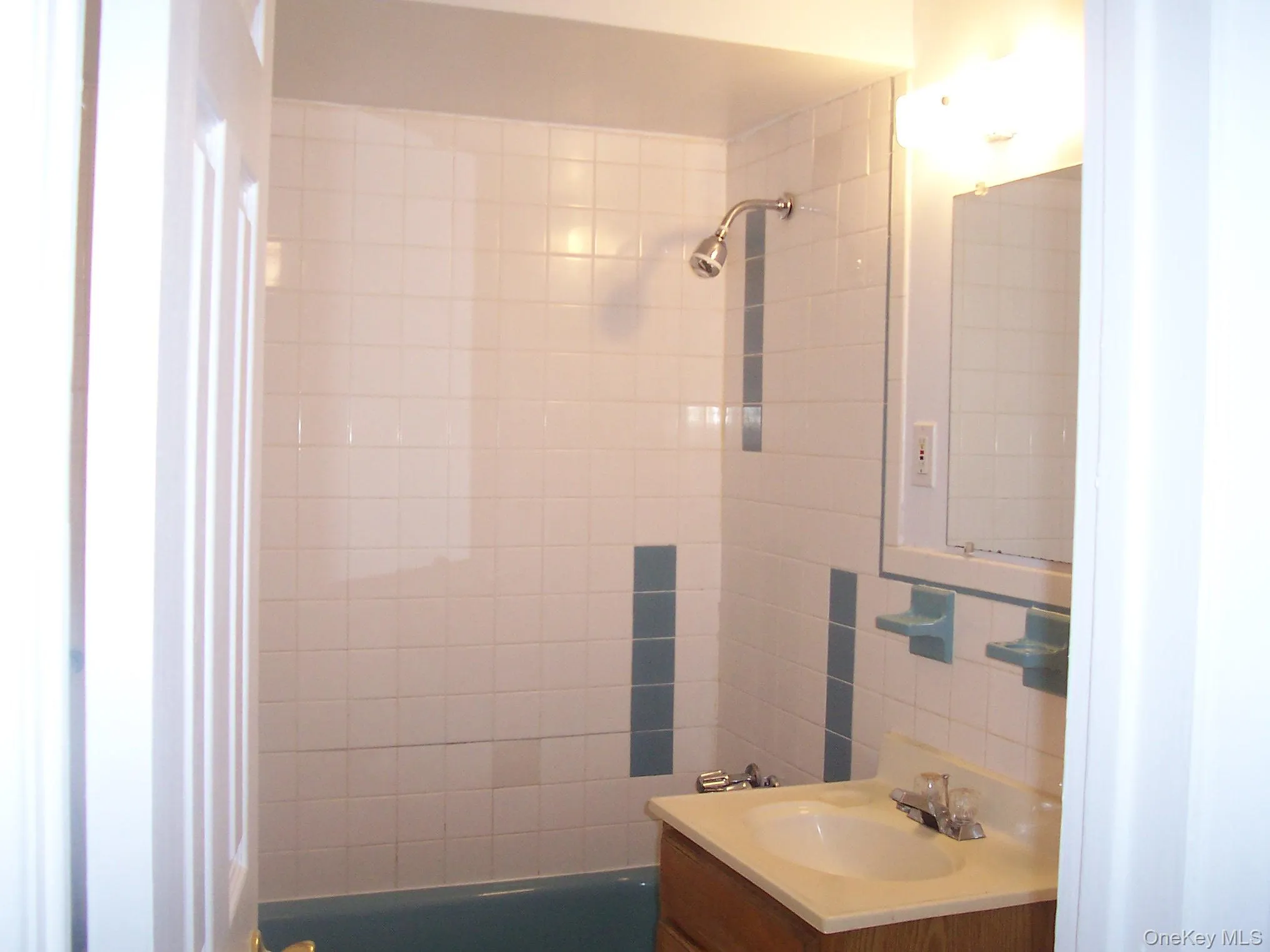 Bathroom with vanity and backsplash Bathroom with vanity and backsplash