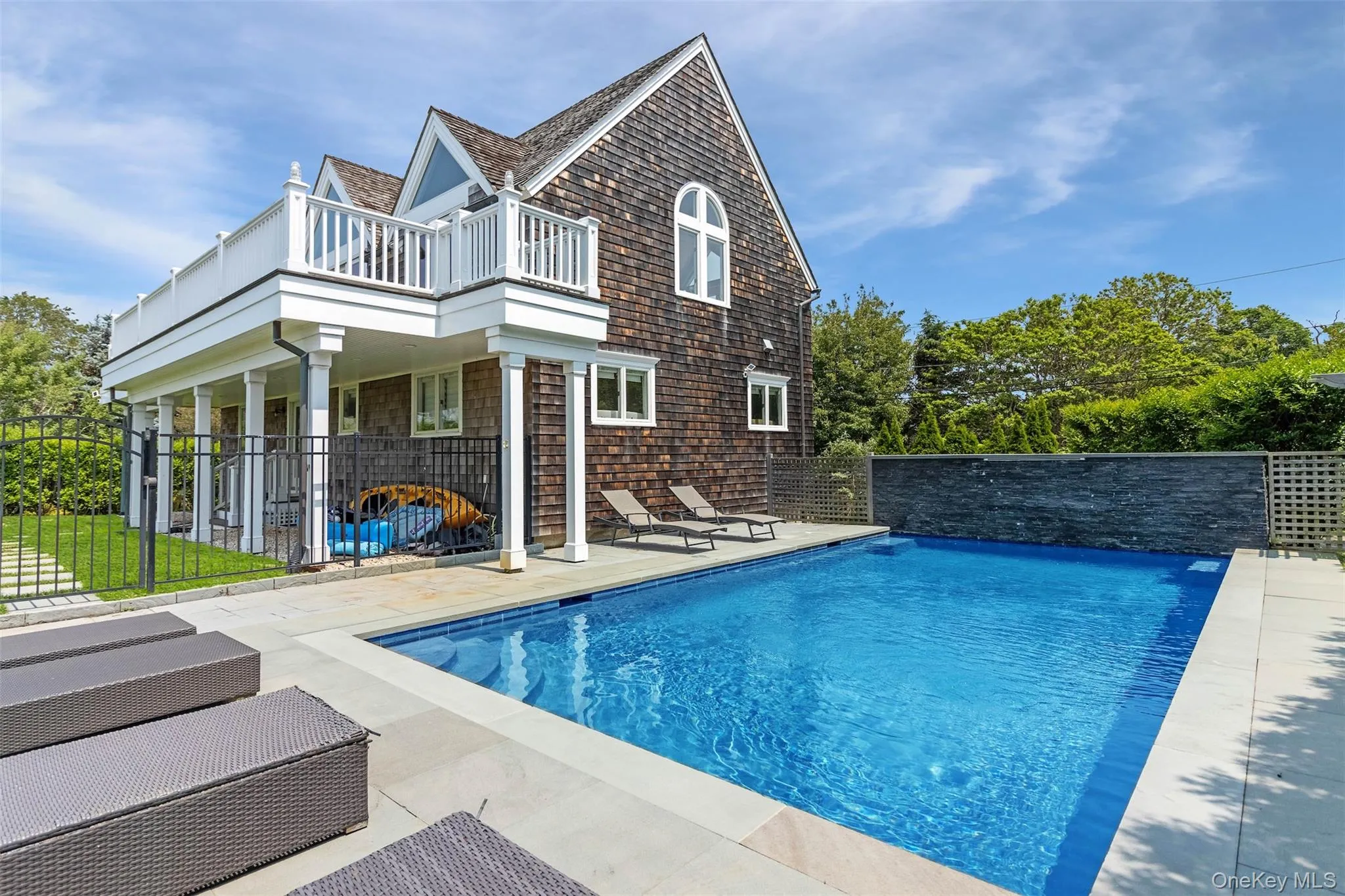 View of pool with a patio View of pool with a patio