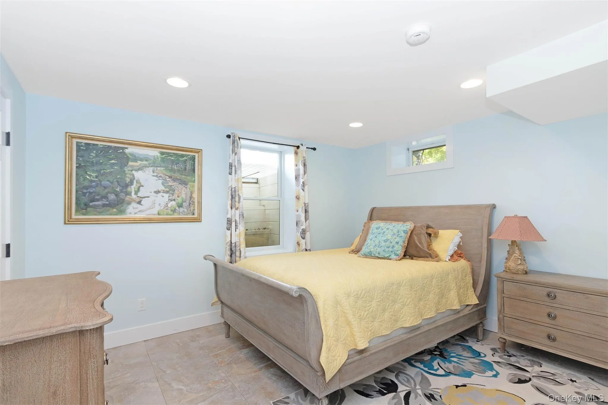 Bedroom featuring baseboards and recessed lighting Bedroom featuring baseboards and recessed lighting