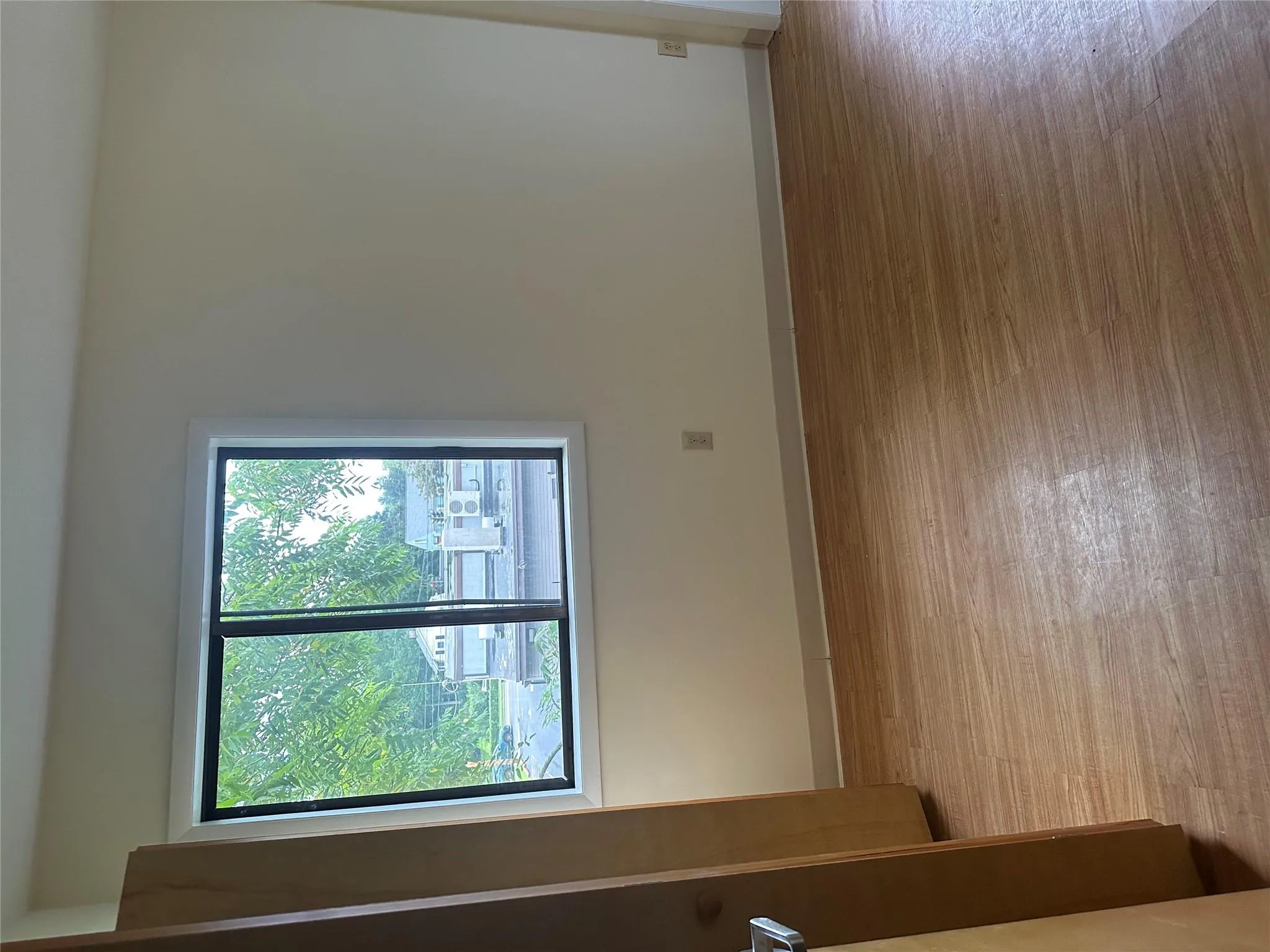 Empty room with light wood finished floors and baseboards Empty room with light wood finished floors and baseboards