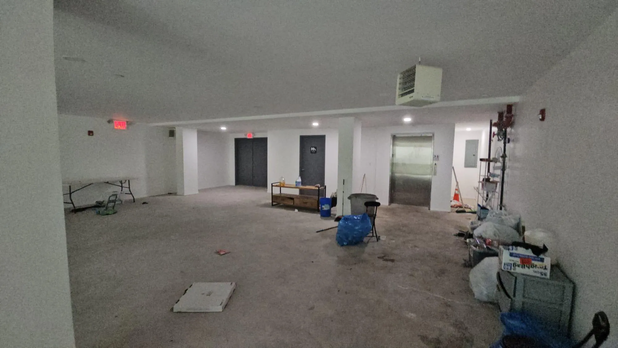 Garage with electric panel and recessed lighting Garage with electric panel and recessed lighting