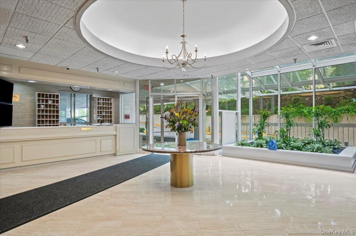 Lobby with recessed lighting and floor to ceiling windows Lobby with recessed lighting and floor to ceiling windows