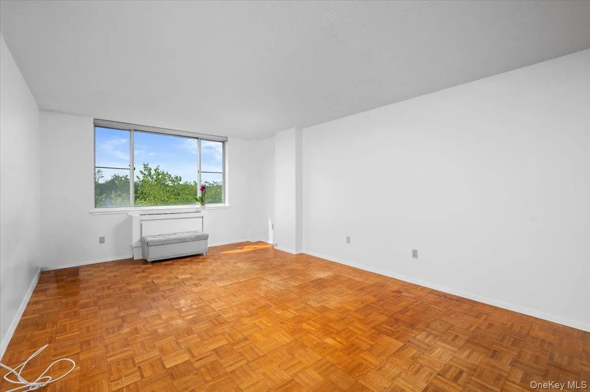 Spacious bedroom with large window Spacious bedroom with large window