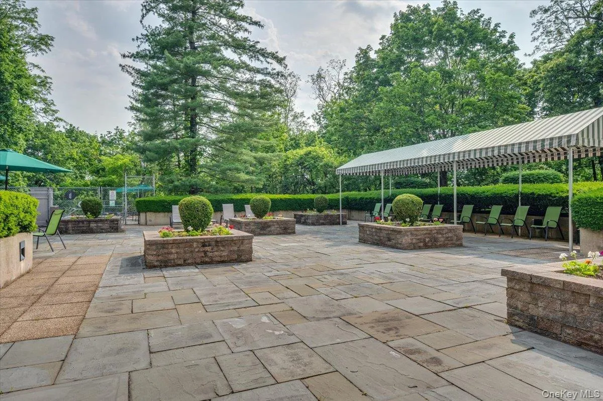 View of patio, sitting area with protective overhang View of patio, sitting area with protective overhang