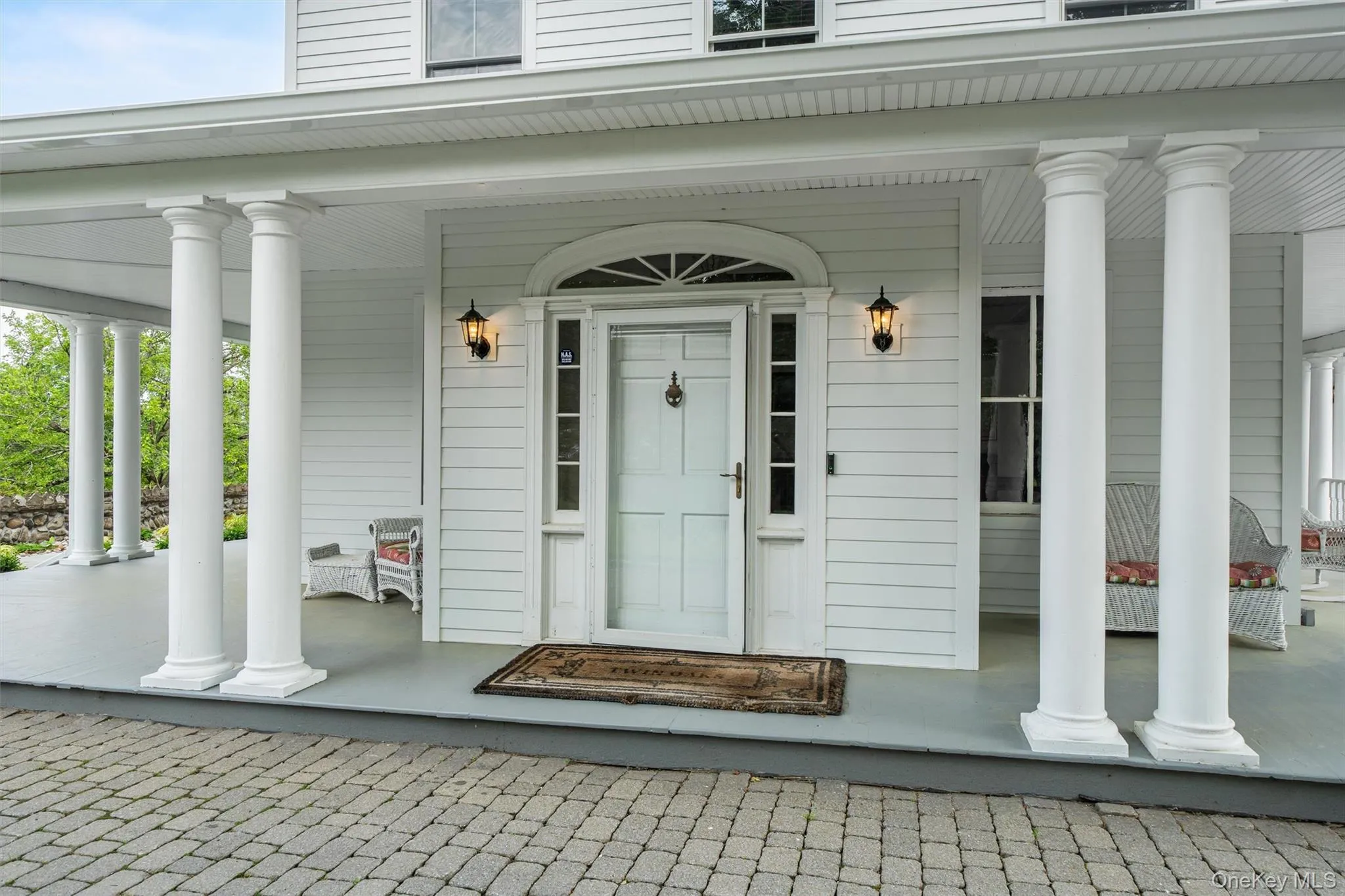 Front porch and main front door entrance to the residence Front porch and main front door entrance to the residence