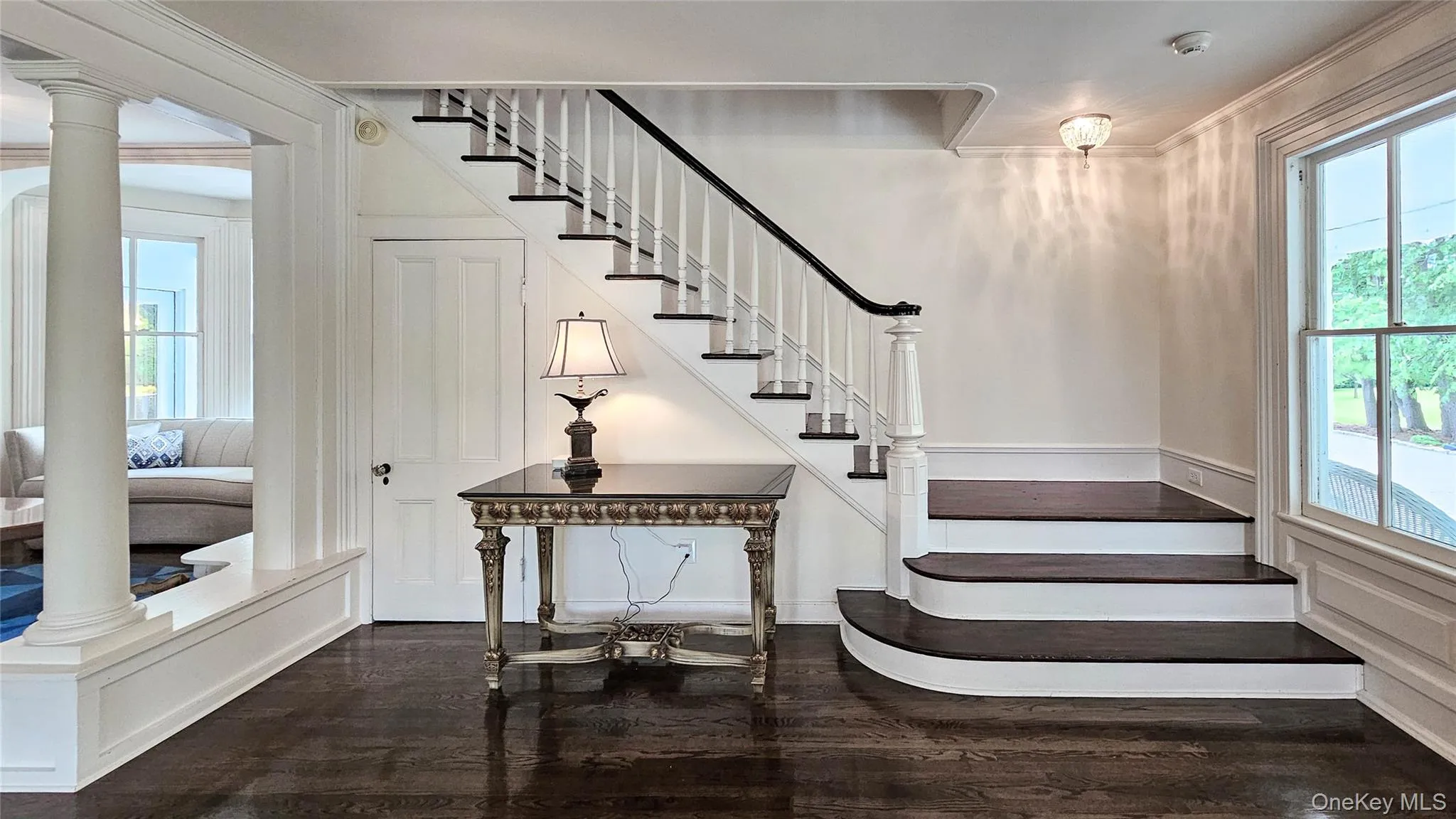 First Floor Living Room - View of Main Staircase to second floor First Floor Living Room - View of Main Staircase to second floor