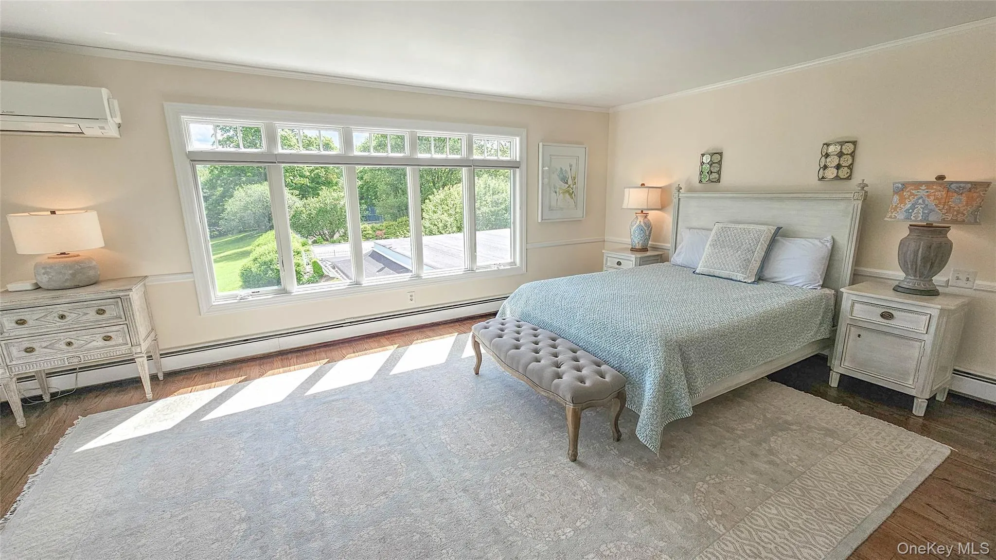 Fully renovated Master Bedroom with two new Anderson picture windows with Hunter Douglas fully electric window shades, refinished hardwood floor, refurbished baseboard heating, all new electrical, new wall lighting, refurbished walls, trim, ceiling, interior doors, Mitsubishi mini-split AC and Heat Fully renovated Master Bedroom with two new Anderson picture windows with Hunter Douglas fully electric window shades, refinished hardwood floor, refurbished baseboard heating, all new electrical, new wall lighting, refurbished walls, trim, ceiling, interior doors, Mitsubishi mini-split AC and Heat