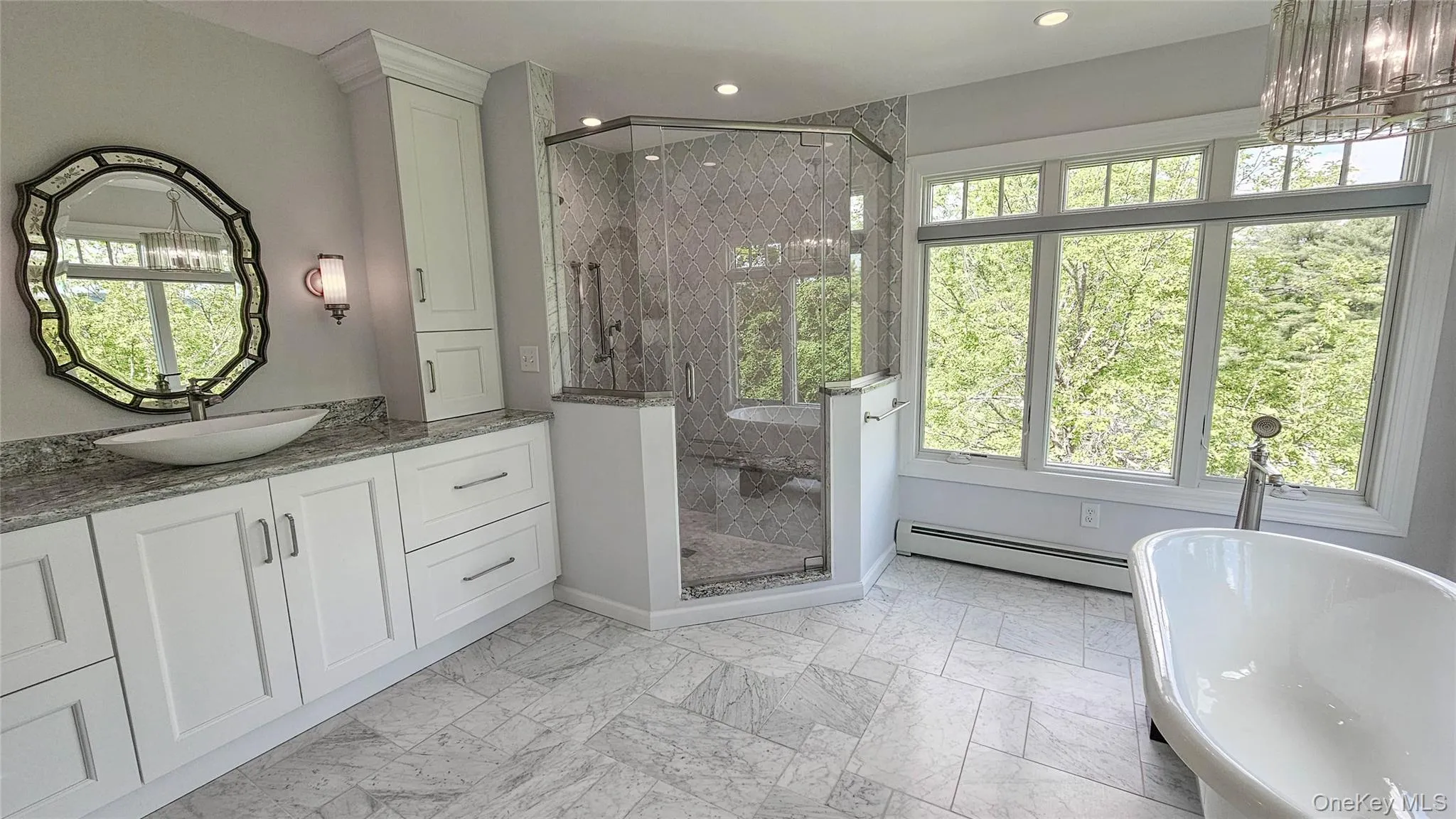 Fully enclosed glass shower with tile walls and floor, recessed lighting Fully enclosed glass shower with tile walls and floor, recessed lighting