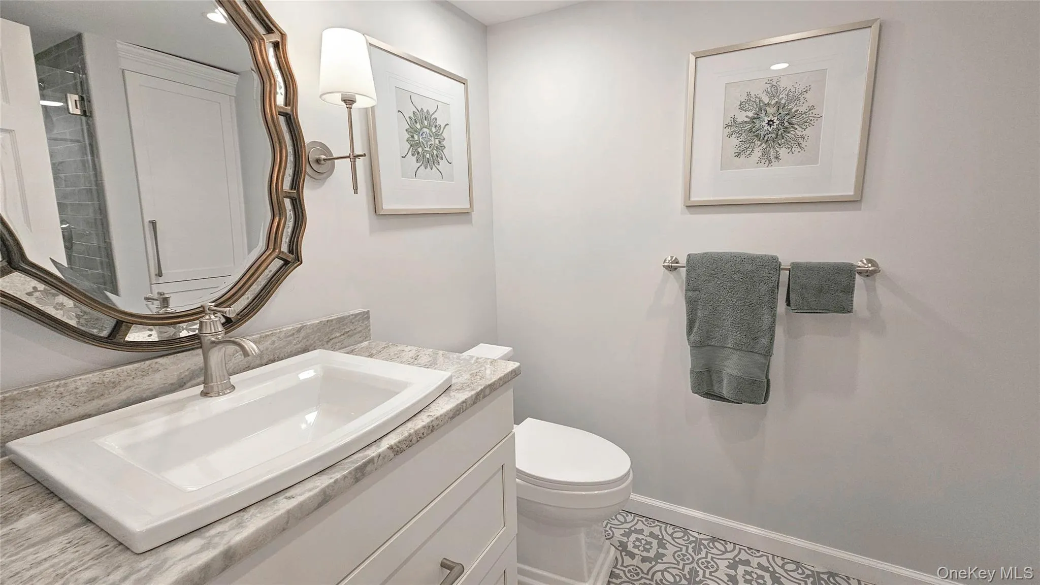 Newly renovated bathroom, all new floor, walls, light fixtures, cabinets, granite counter, light fixtures, mirrors Newly renovated bathroom, all new floor, walls, light fixtures, cabinets, granite counter, light fixtures, mirrors