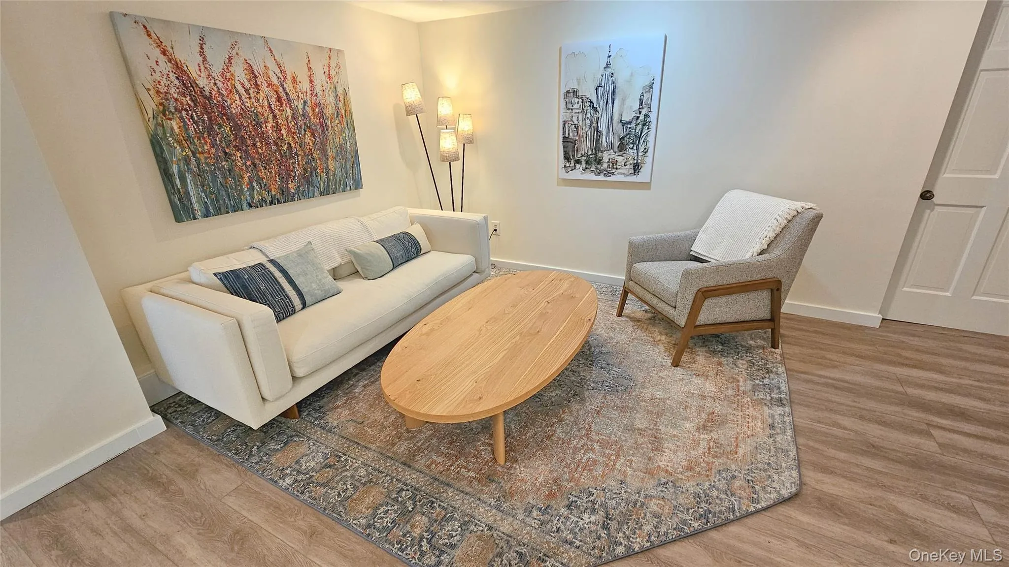 Lower level sitting area with all new floors, refurbished walls, recessed lighting Lower level sitting area with all new floors, refurbished walls, recessed lighting