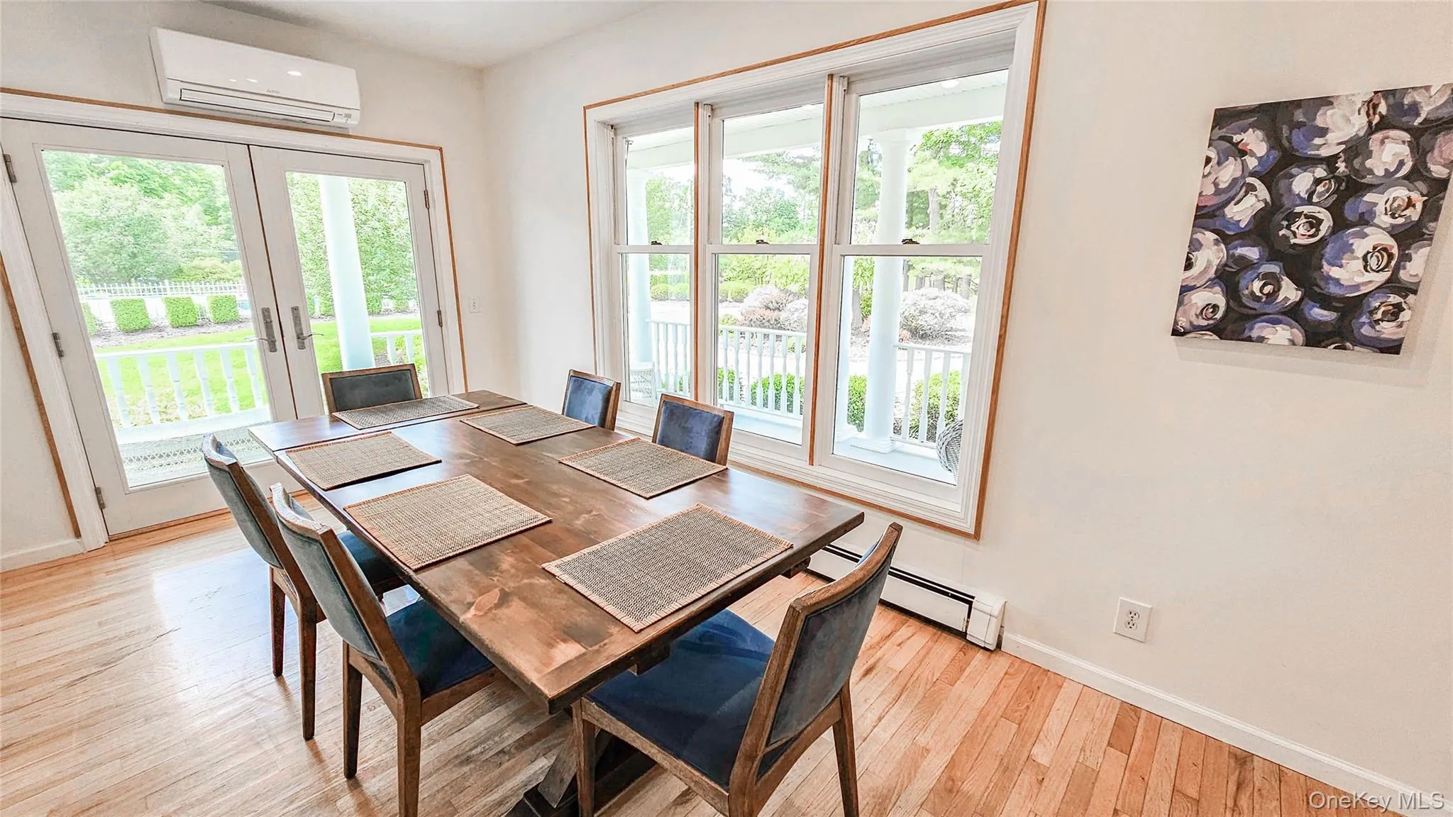 Dining nook with new front and side double doors. Both doors open to the covered front porch. Accesses the pantry and the first floor bathroom. Dining nook with new front and side double doors. Both doors open to the covered front porch. Accesses the pantry and the first floor bathroom.