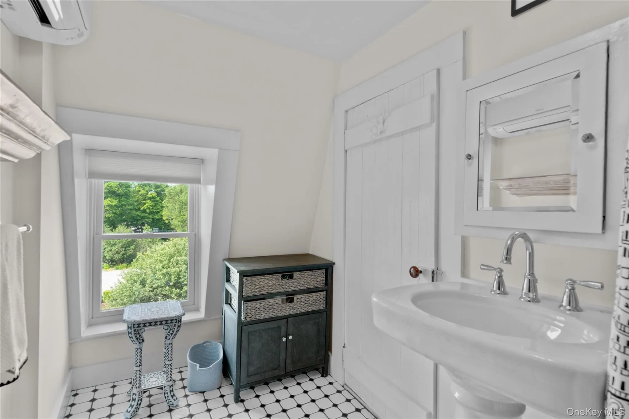Third floor bathroom featuring tile patterned floors, new plumbing, a Mitsubishi mini-split for AC and heat, Hunter Douglas window shade Third floor bathroom featuring tile patterned floors, new plumbing, a Mitsubishi mini-split for AC and heat, Hunter Douglas window shade