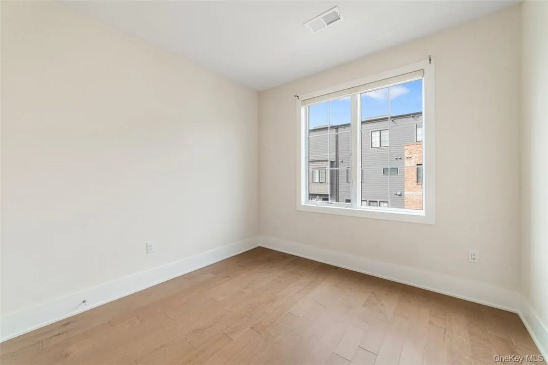 Bedroom with two windows and double closet (not shown) Bedroom with two windows and double closet (not shown)