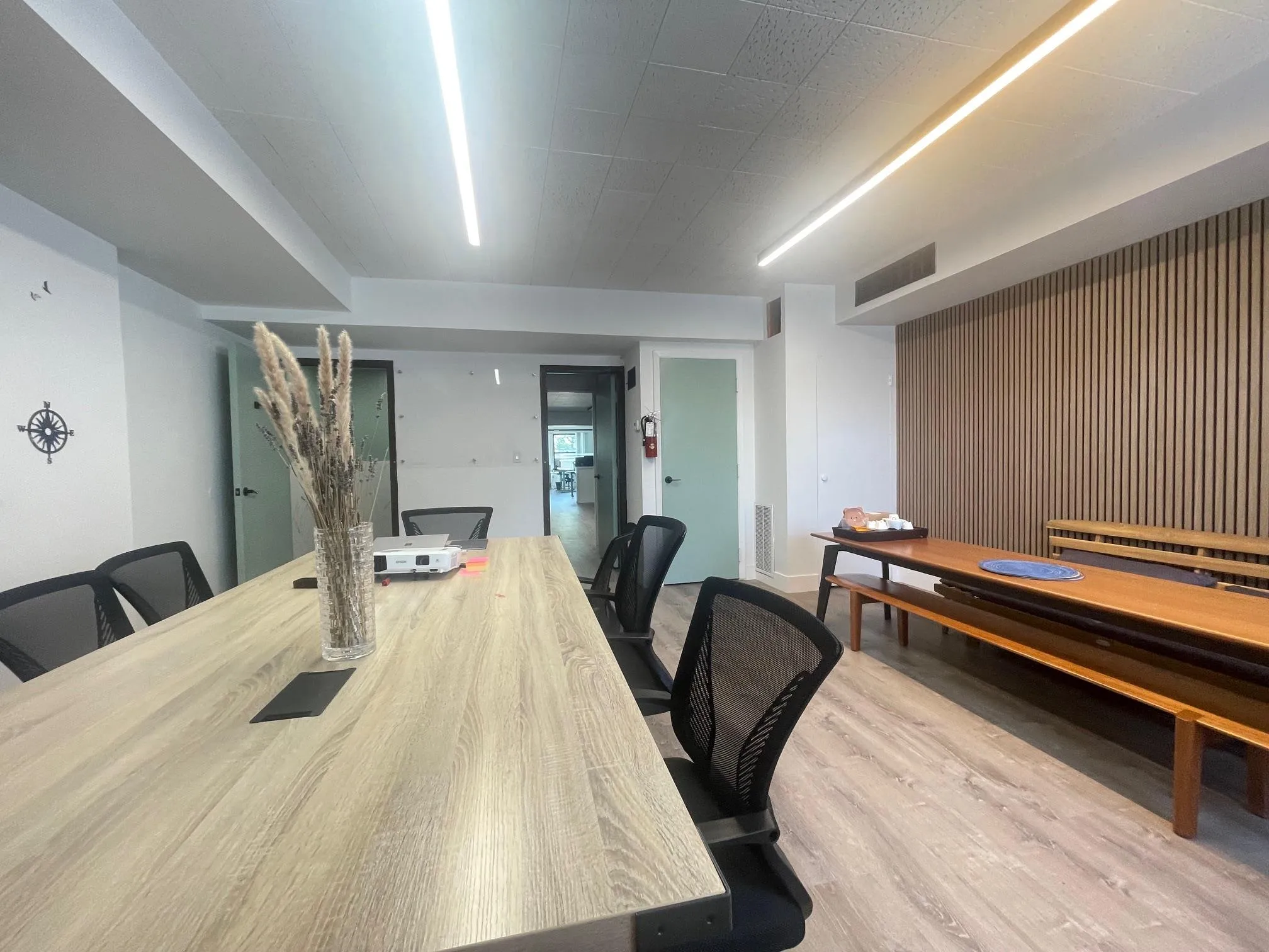 Office space featuring wood finished floors Office space featuring wood finished floors