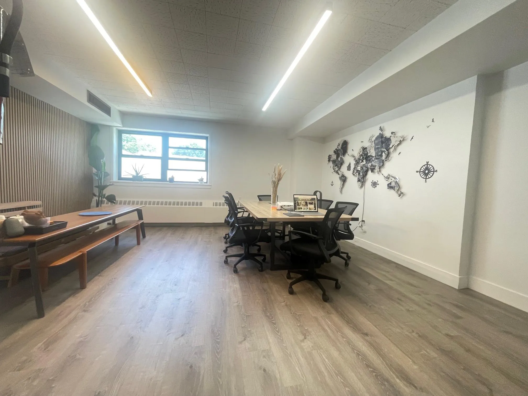 Office featuring radiator and wood finished floors Office featuring radiator and wood finished floors