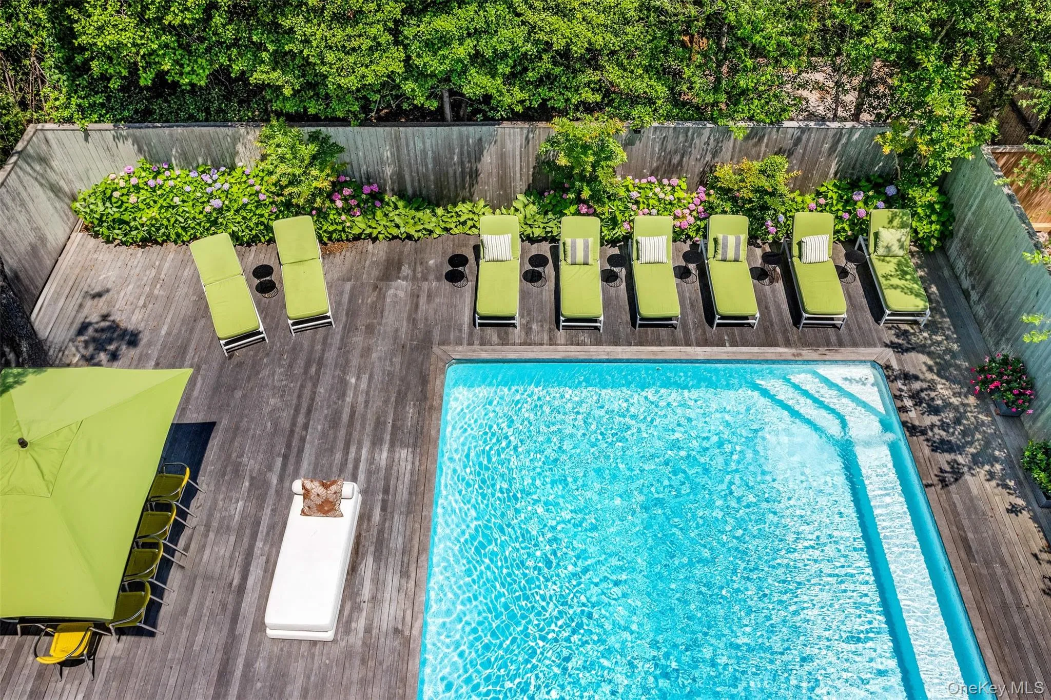 View of pool featuring a fenced backyard View of pool featuring a fenced backyard