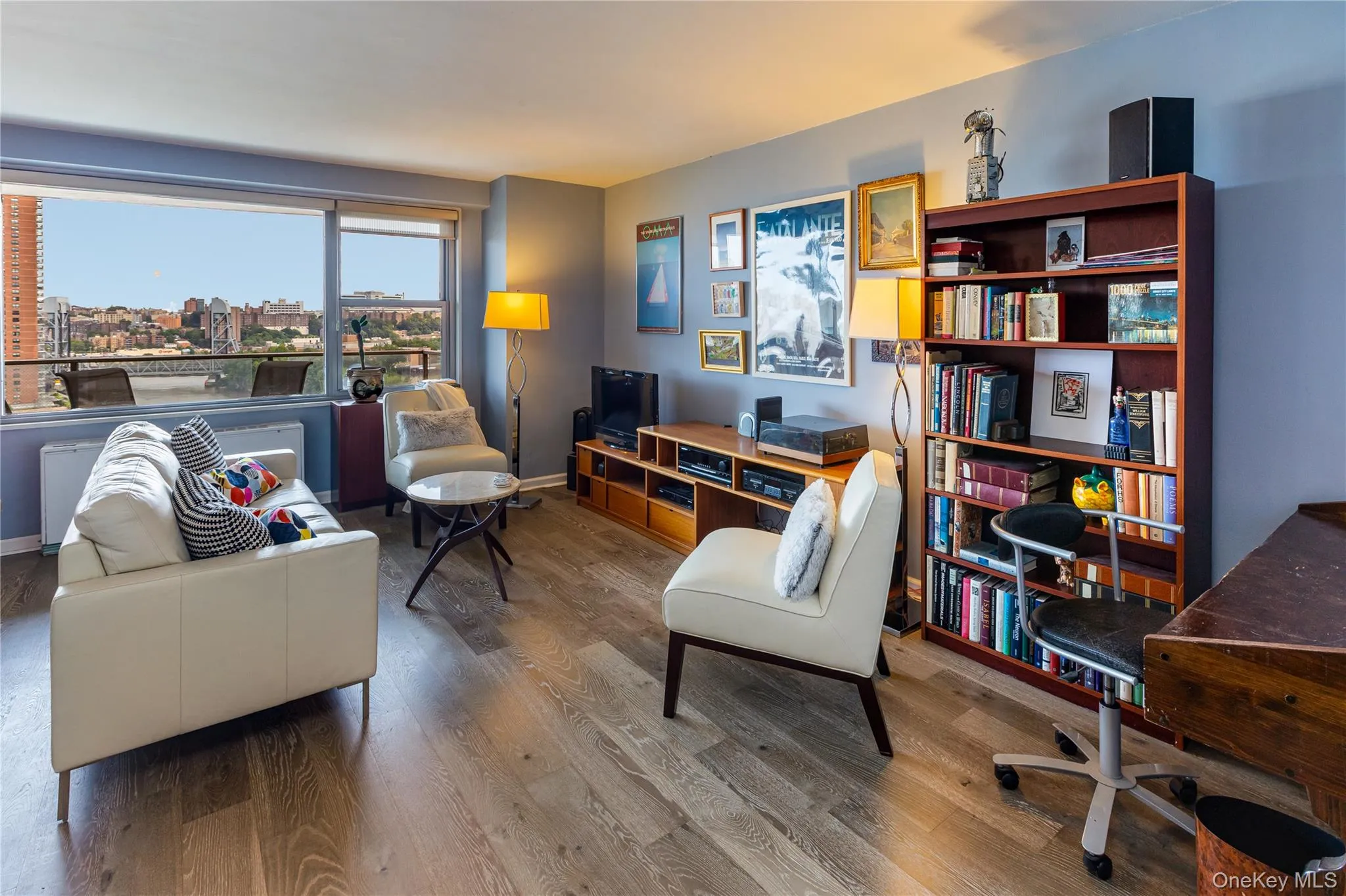 Living room featuring wood finished floors and baseboards Living room featuring wood finished floors and baseboards