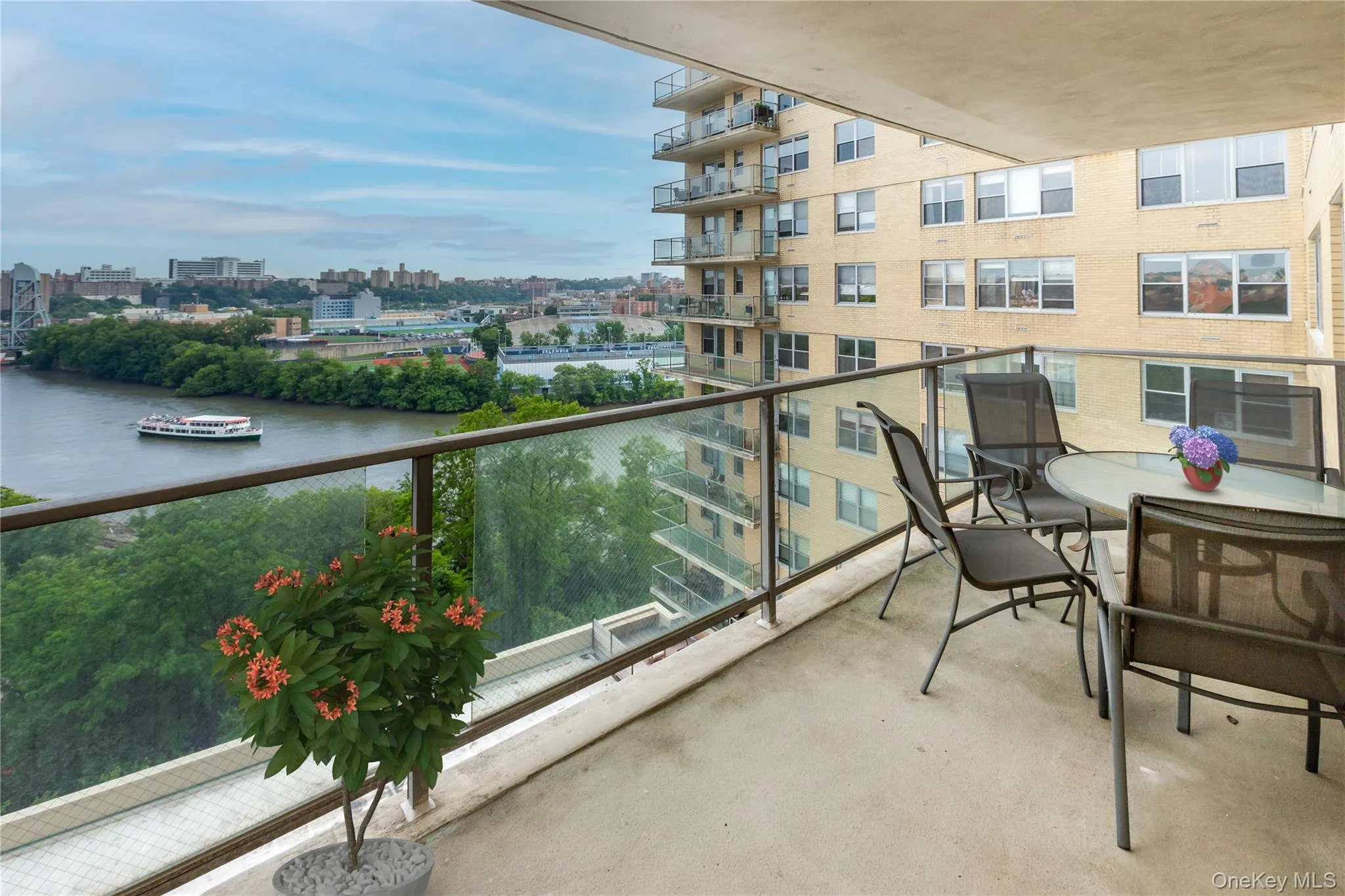 Balcony featuring a water view and a city view Balcony featuring a water view and a city view