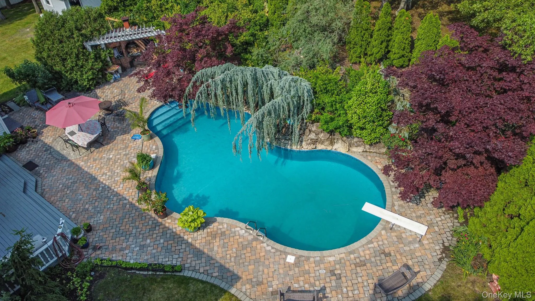 Drone / aerial view of a pool area Drone / aerial view of a pool area