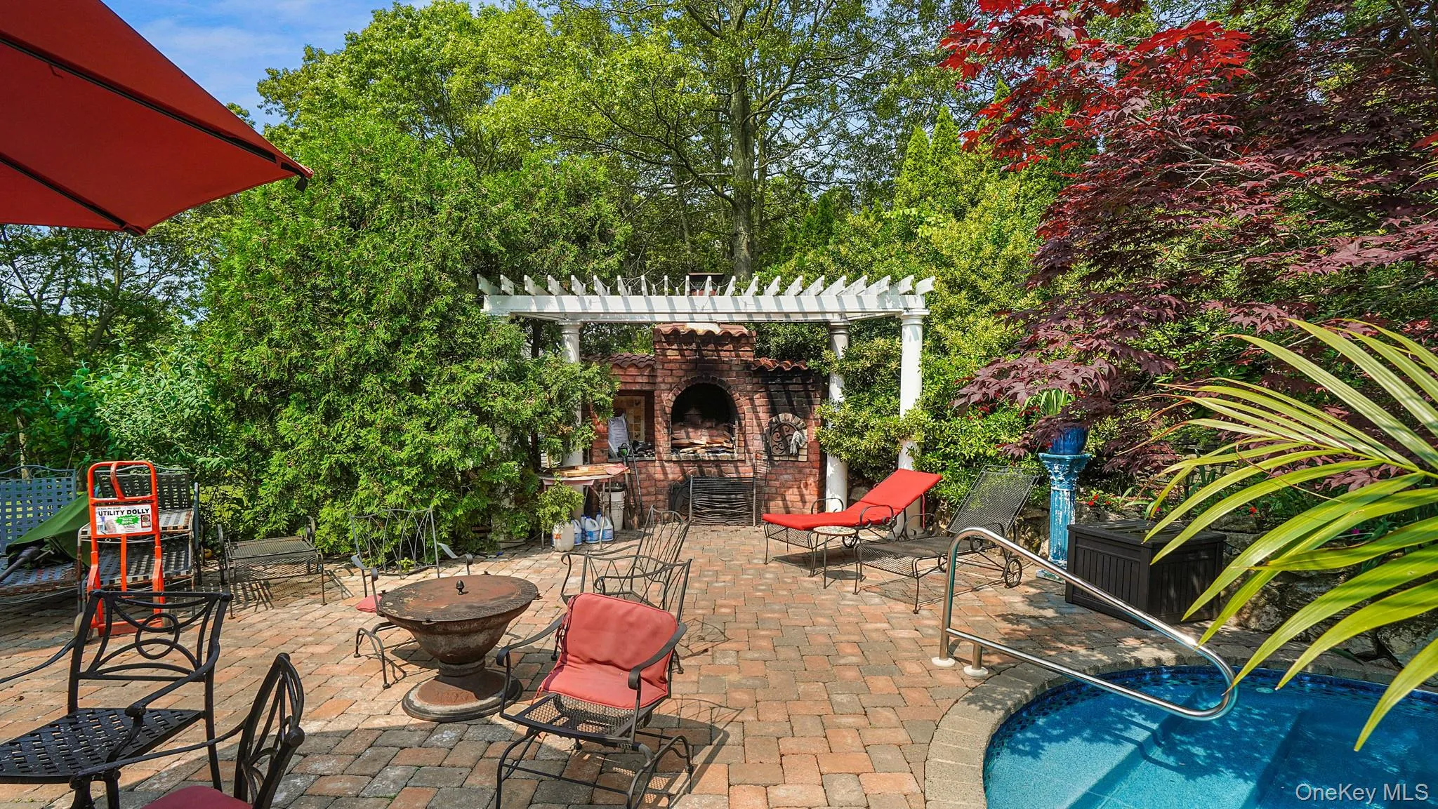 View of patio / terrace featuring a pergola and an outdoor pool View of patio / terrace featuring a pergola and an outdoor pool