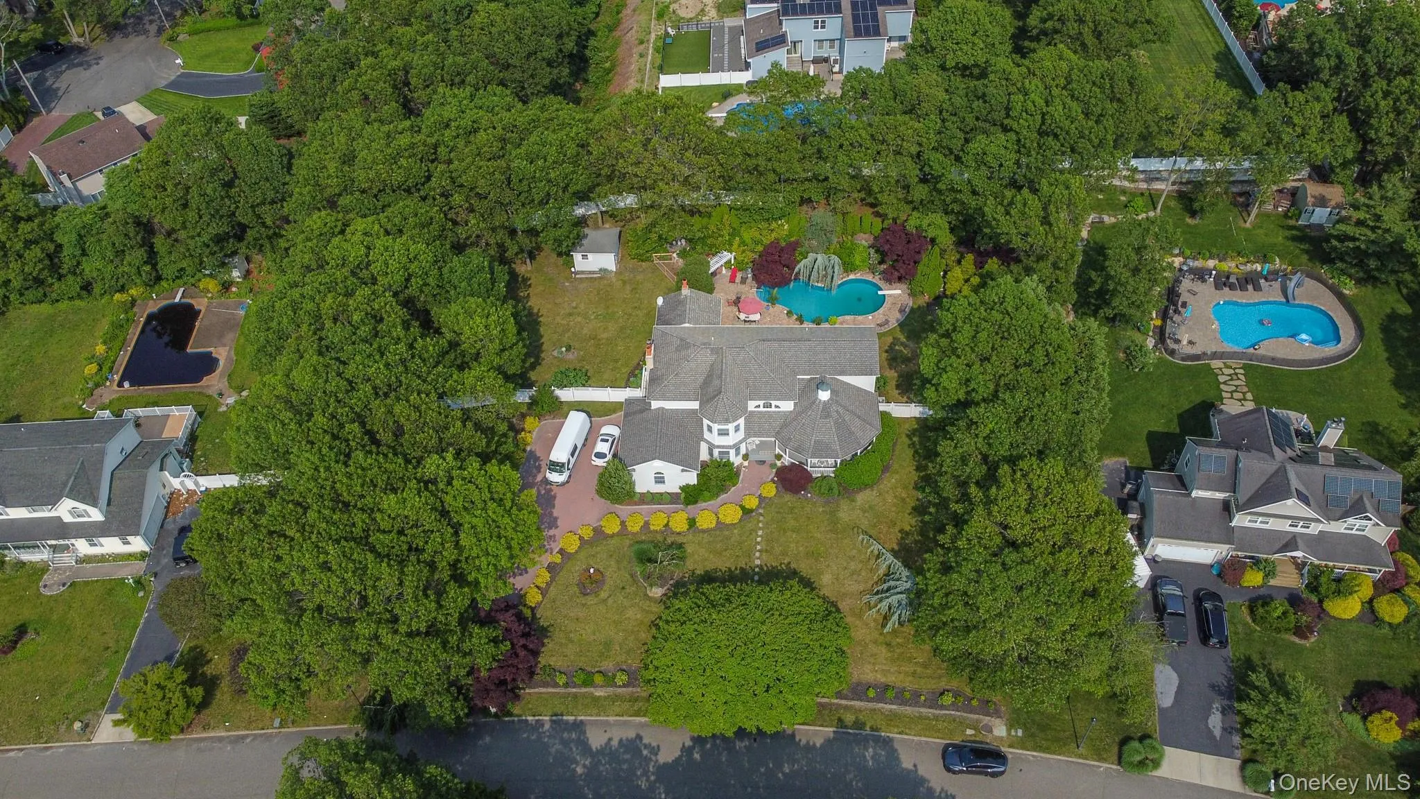 Aerial view of property's location with nearby suburban area Aerial view of property's location with nearby suburban area