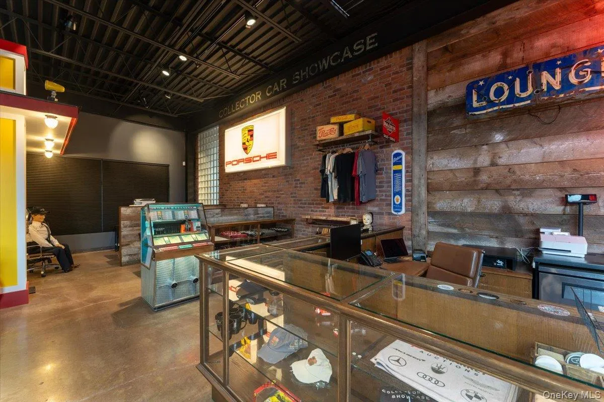 Misc room featuring finished concrete floors Misc room featuring finished concrete floors