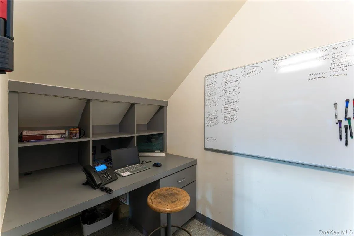 Office with baseboards and built in study area Office with baseboards and built in study area