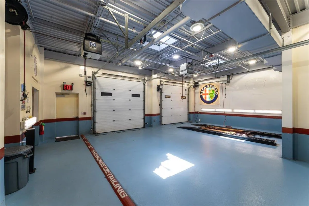 Garage featuring a garage door opener Garage featuring a garage door opener