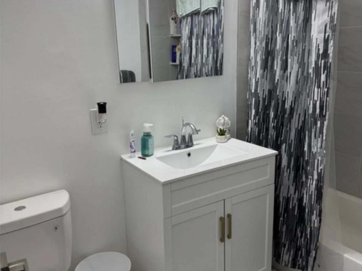 Bathroom with vanity and shower / bath combo Bathroom with vanity and shower / bath combo