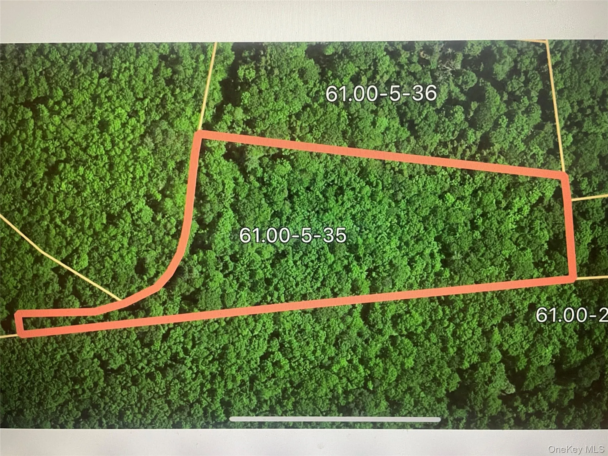Aerial view of property's location featuring property boundaries highlighted Aerial view of property's location featuring property boundaries highlighted