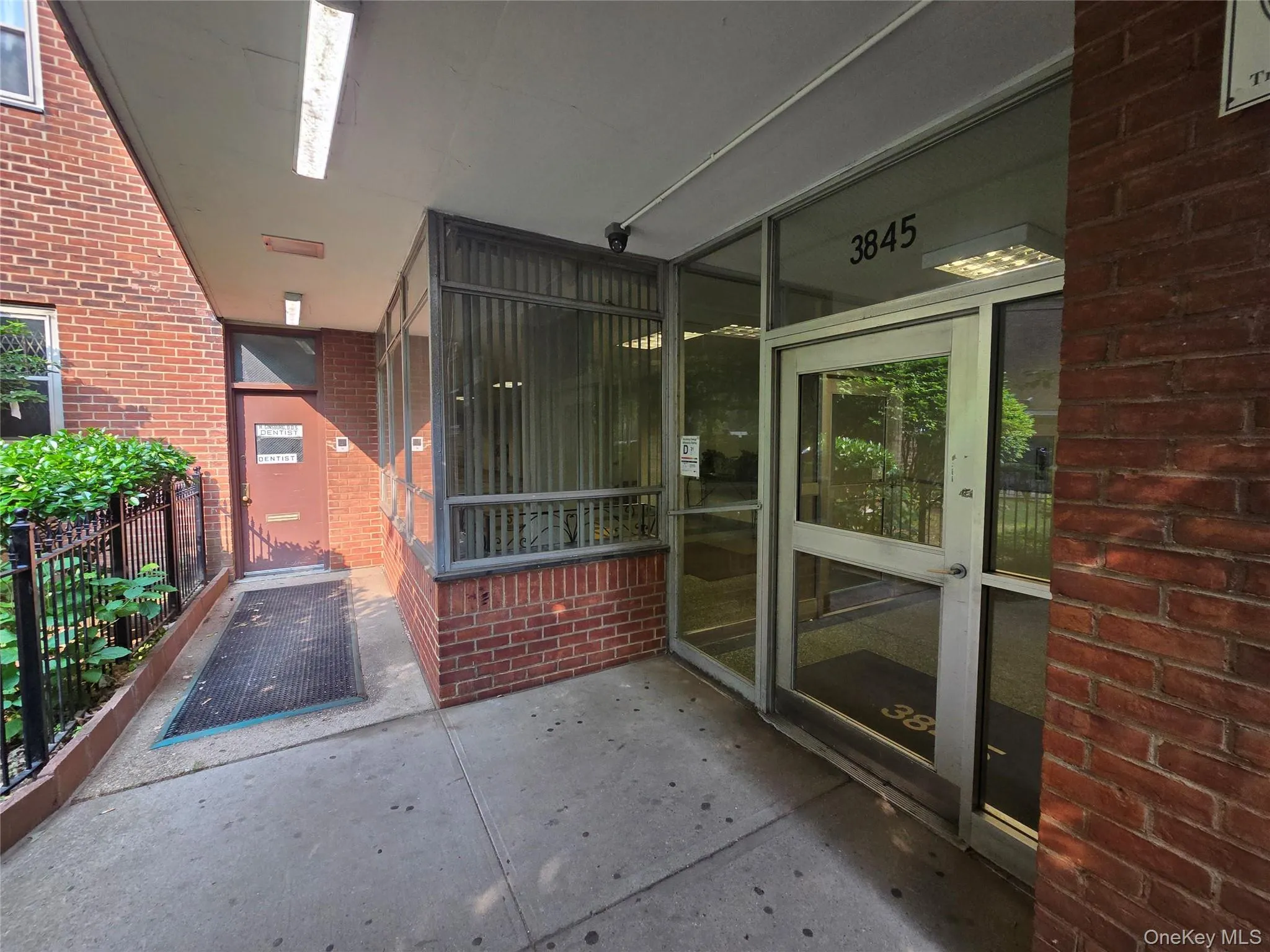 Entrance to property with brick siding Entrance to property with brick siding