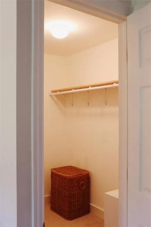 View of walk in closet View of walk in closet