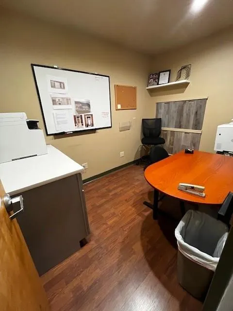 Office space featuring wood finished floors Office space featuring wood finished floors