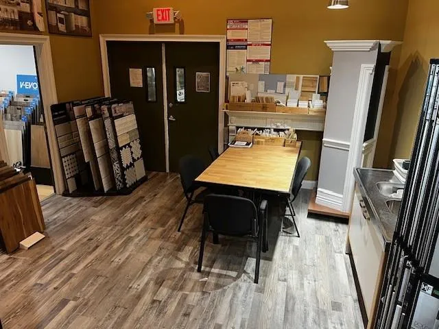 Dining space with light wood-style flooring Dining space with light wood-style flooring