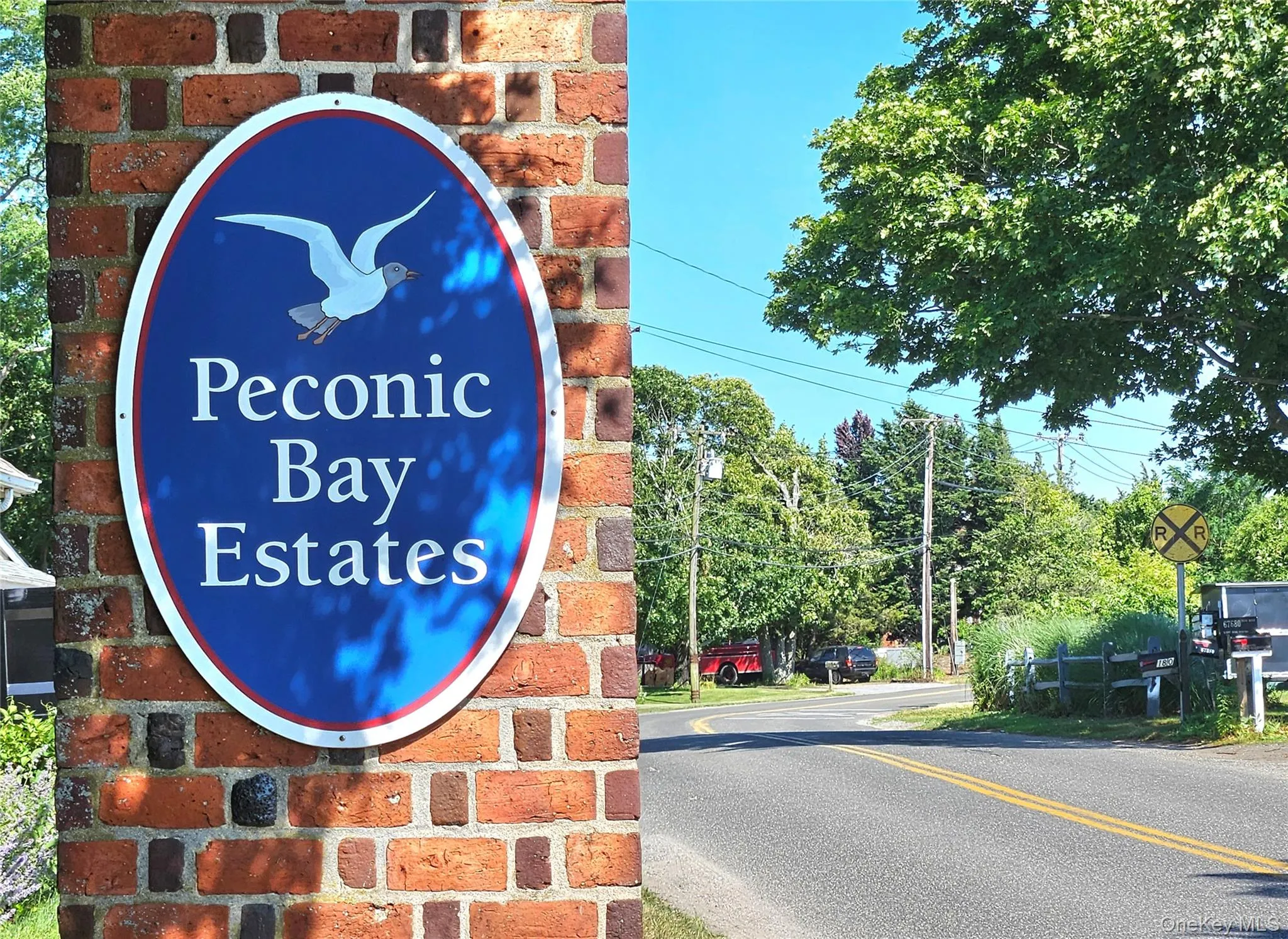 Two Brick Pillars Welcome You To The Road On The Bayfront Two Brick Pillars Welcome You To The Road On The Bayfront