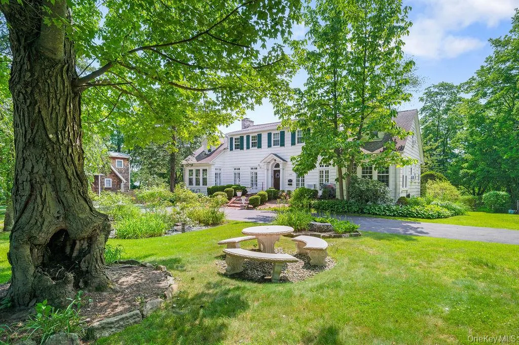 View of front of property featuring a front lawn. View of front of property featuring a front lawn.