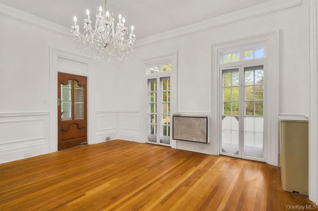 Dining Room with french doors to porch. Dining Room with french doors to porch.