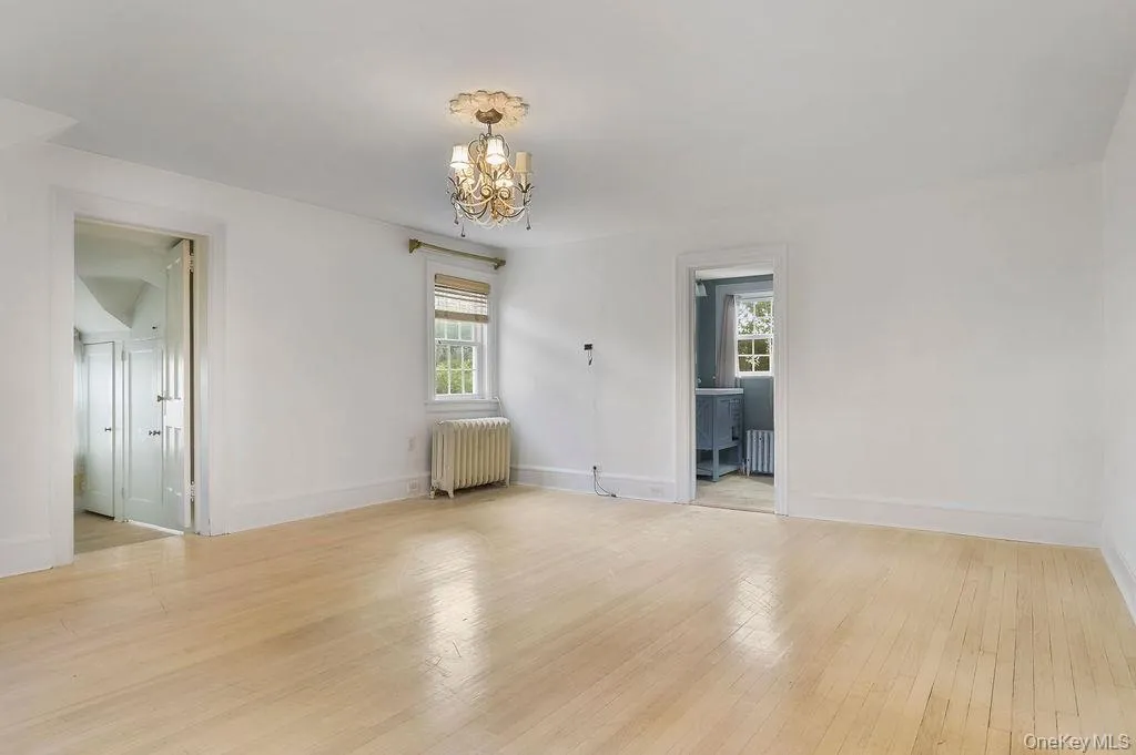 Primary bedroom with full bath and dressing room. Primary bedroom with full bath and dressing room.