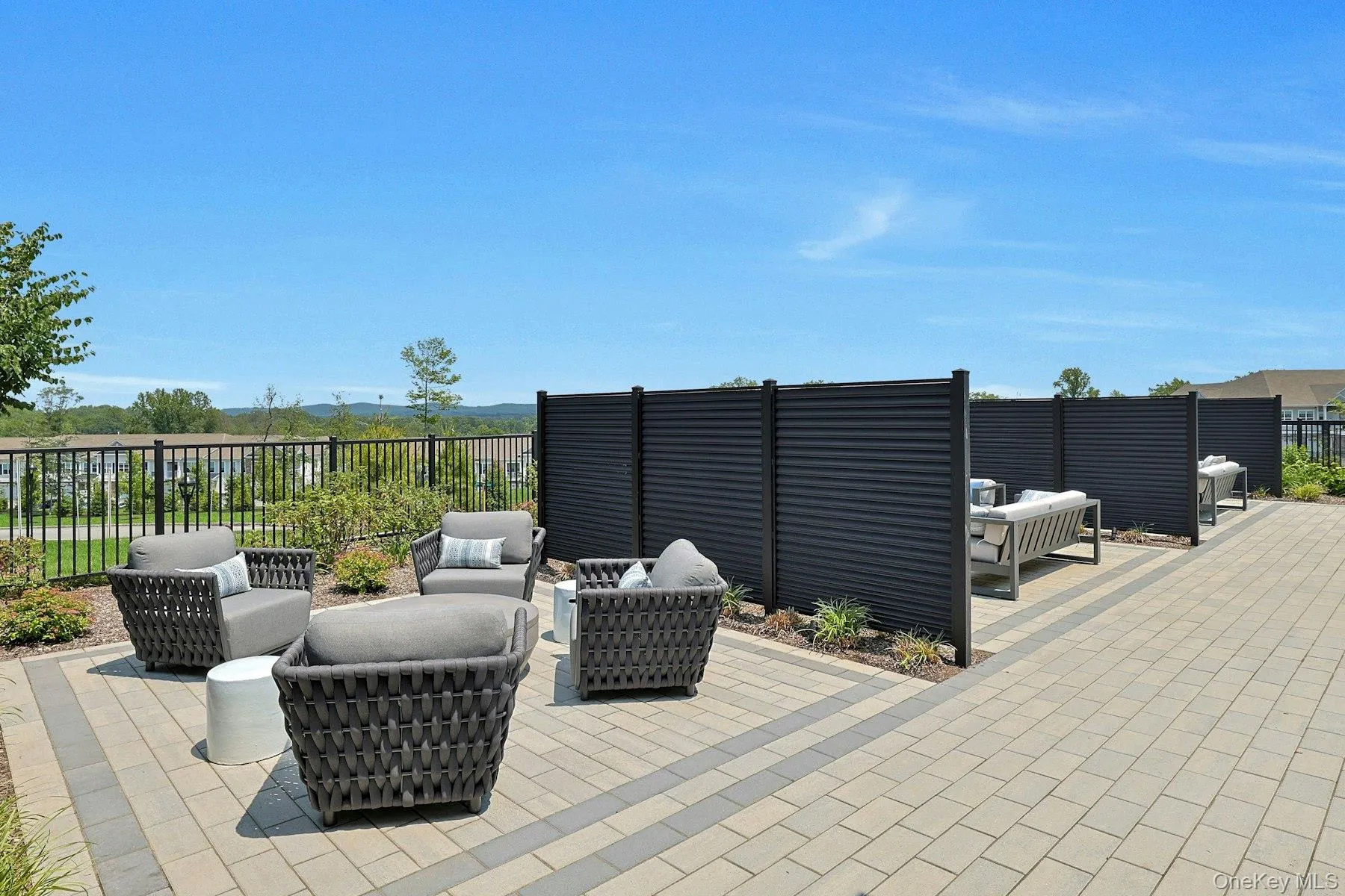 Patio with private seating areas Patio with private seating areas