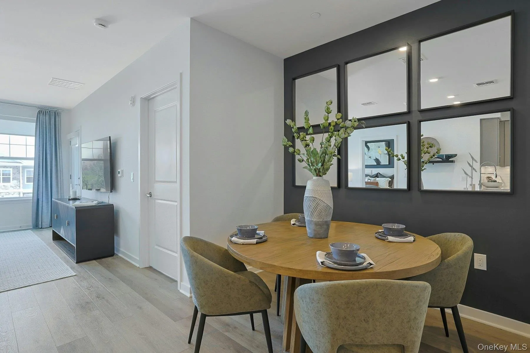 Dining area featuring light wood-style flooring Dining area featuring light wood-style flooring