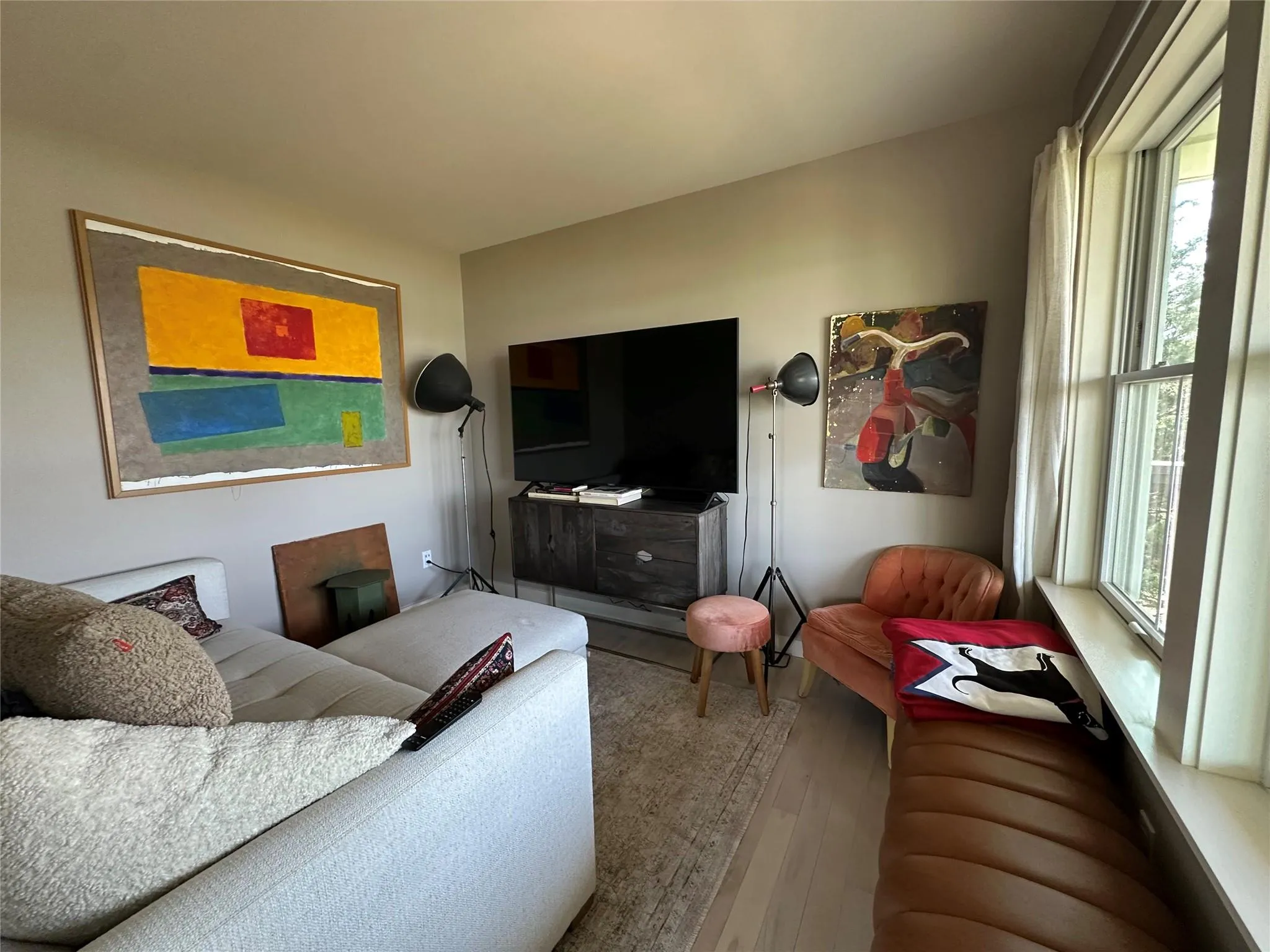 Living area with hardwood / wood-style floors Living area with hardwood / wood-style floors