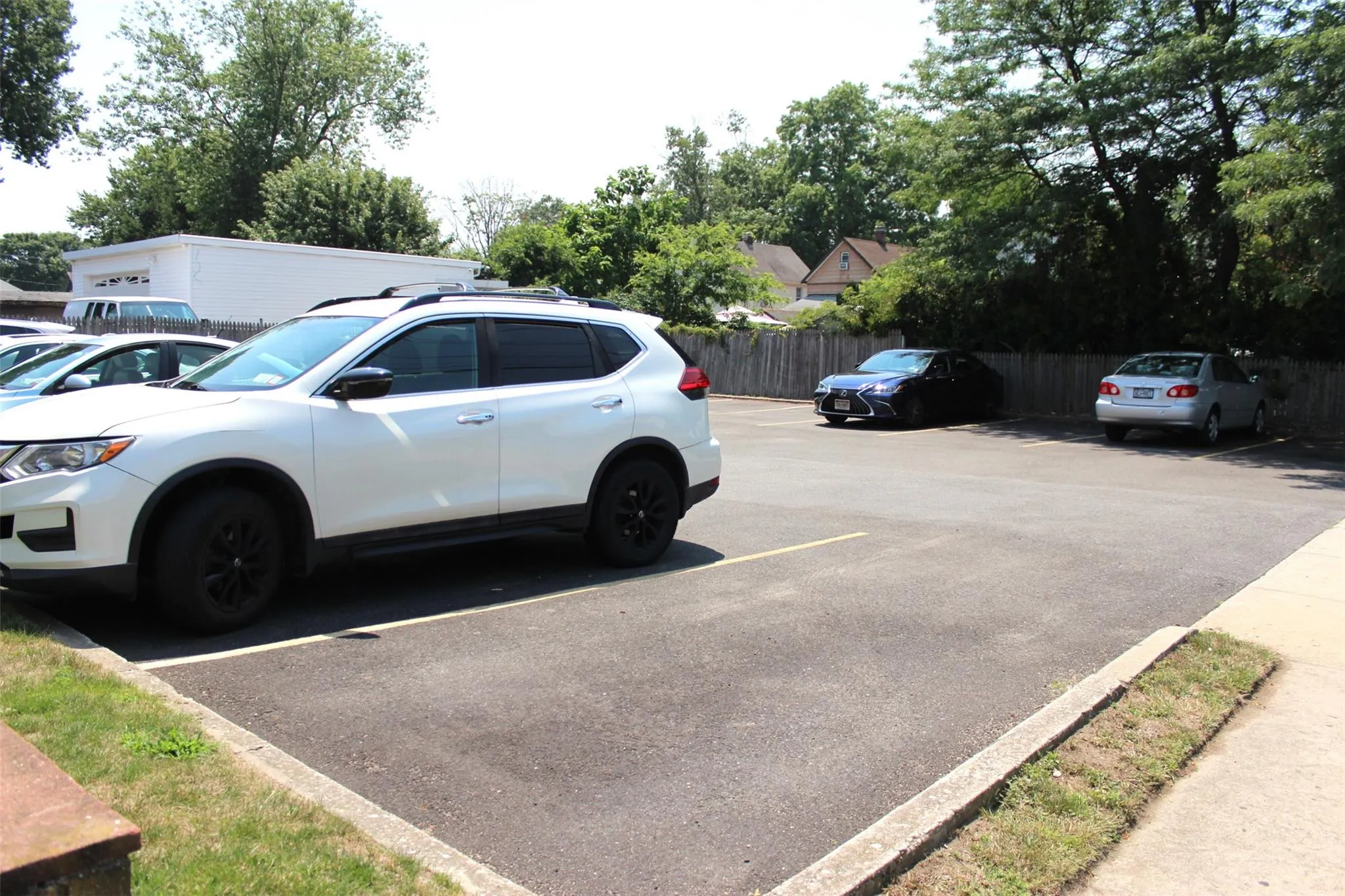View of uncovered parking lot View of uncovered parking lot