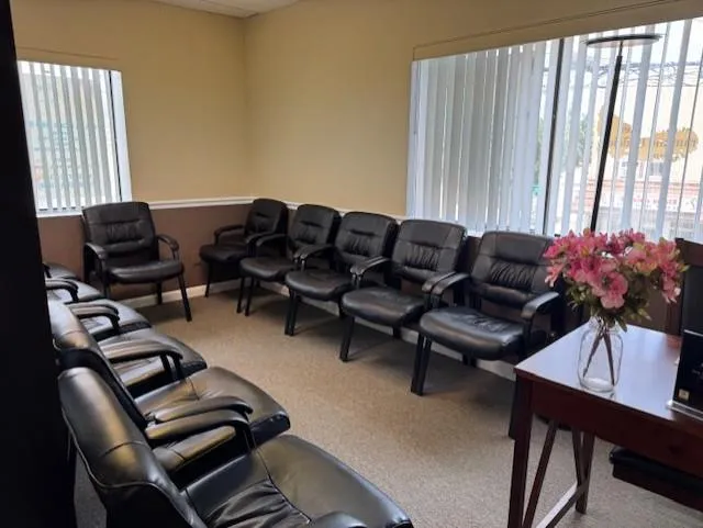 Living room with healthy amount of natural light and carpet flooring Living room with healthy amount of natural light and carpet flooring