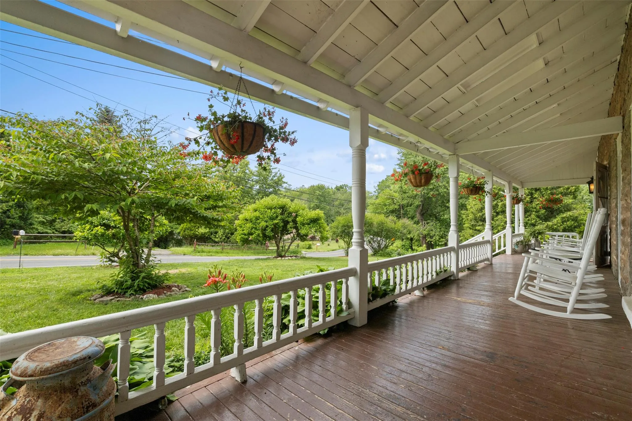 Porch featuring a lawn Porch featuring a lawn