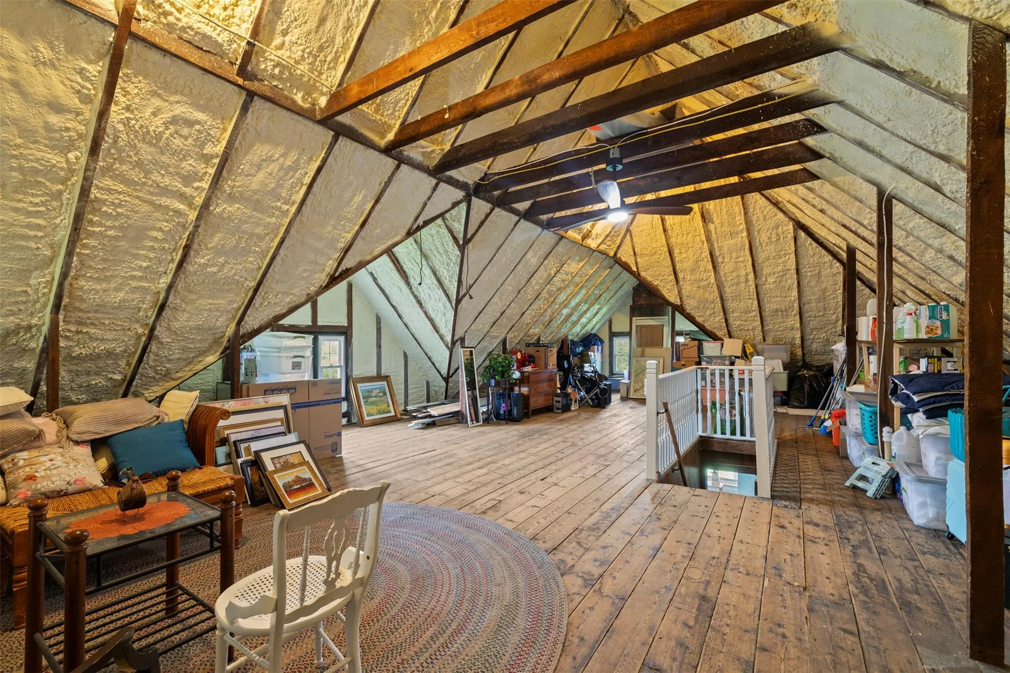 Unfinished attic with an upstairs landing Unfinished attic with an upstairs landing