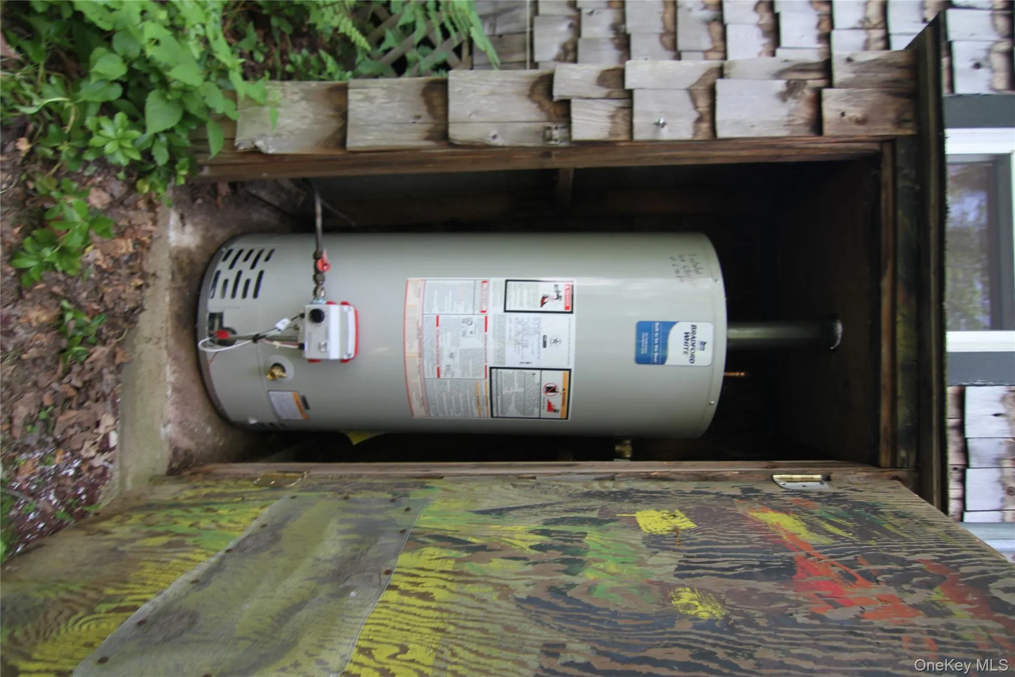 Utilities featuring water heater Utilities featuring water heater