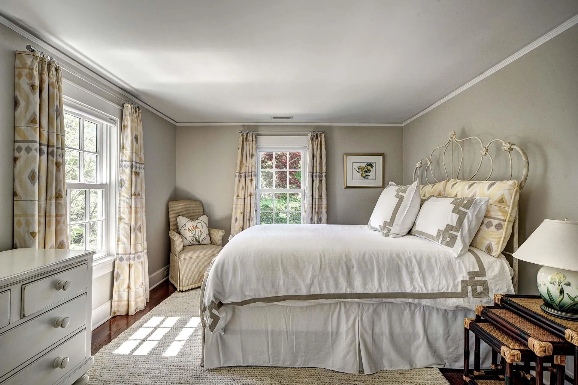 Bedroom with wood finished floors and ornamental molding Bedroom with wood finished floors and ornamental molding