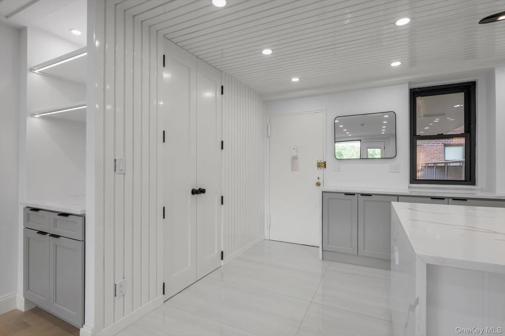 Hall featuring recessed lighting and baseboards Hall featuring recessed lighting and baseboards